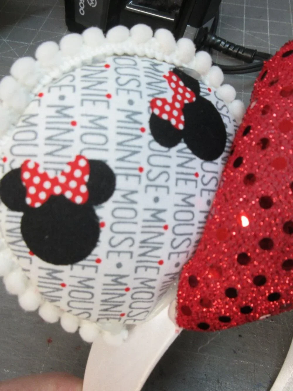 Minnie Mouse Ears - White trim, red Sequin bow fits an adult
